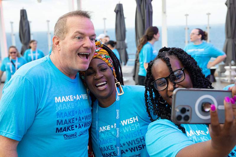 Dream Vacations franchise owners having fun at a Make a Wish event