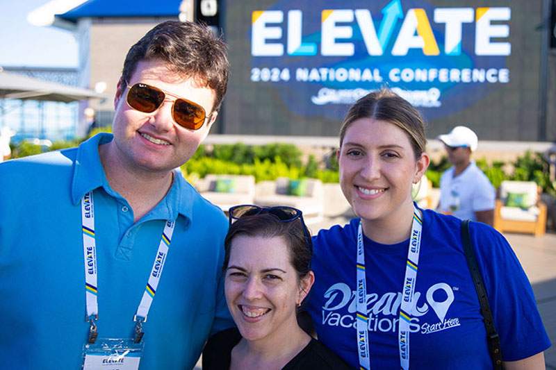 a man and two women posing for a picture